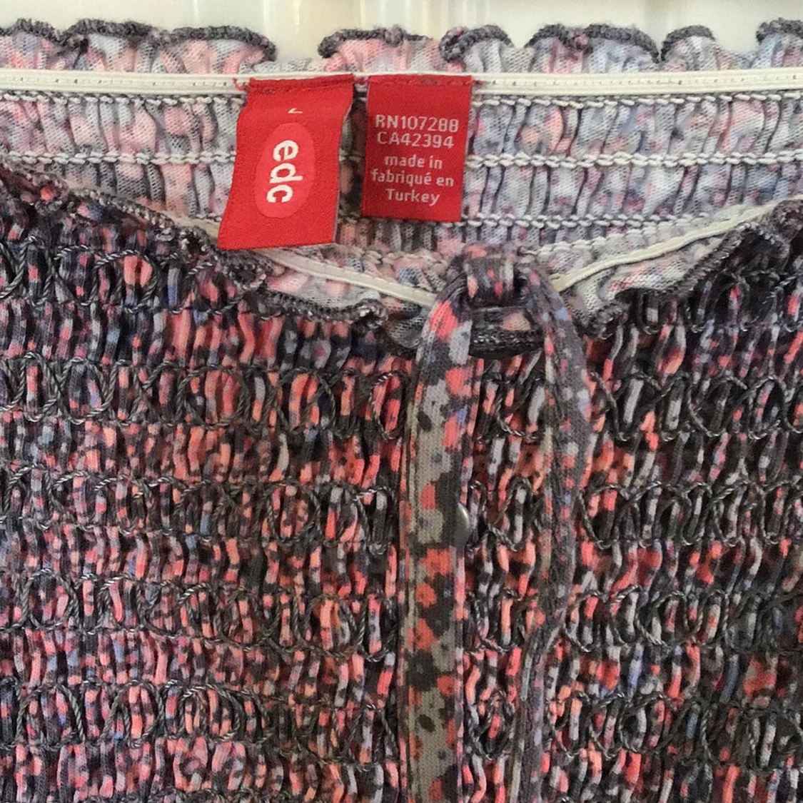 Blommig topp från  EDC - 1