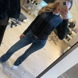 Blå bootcut jeans - Kommer inte till använding. Storlek W27 L32