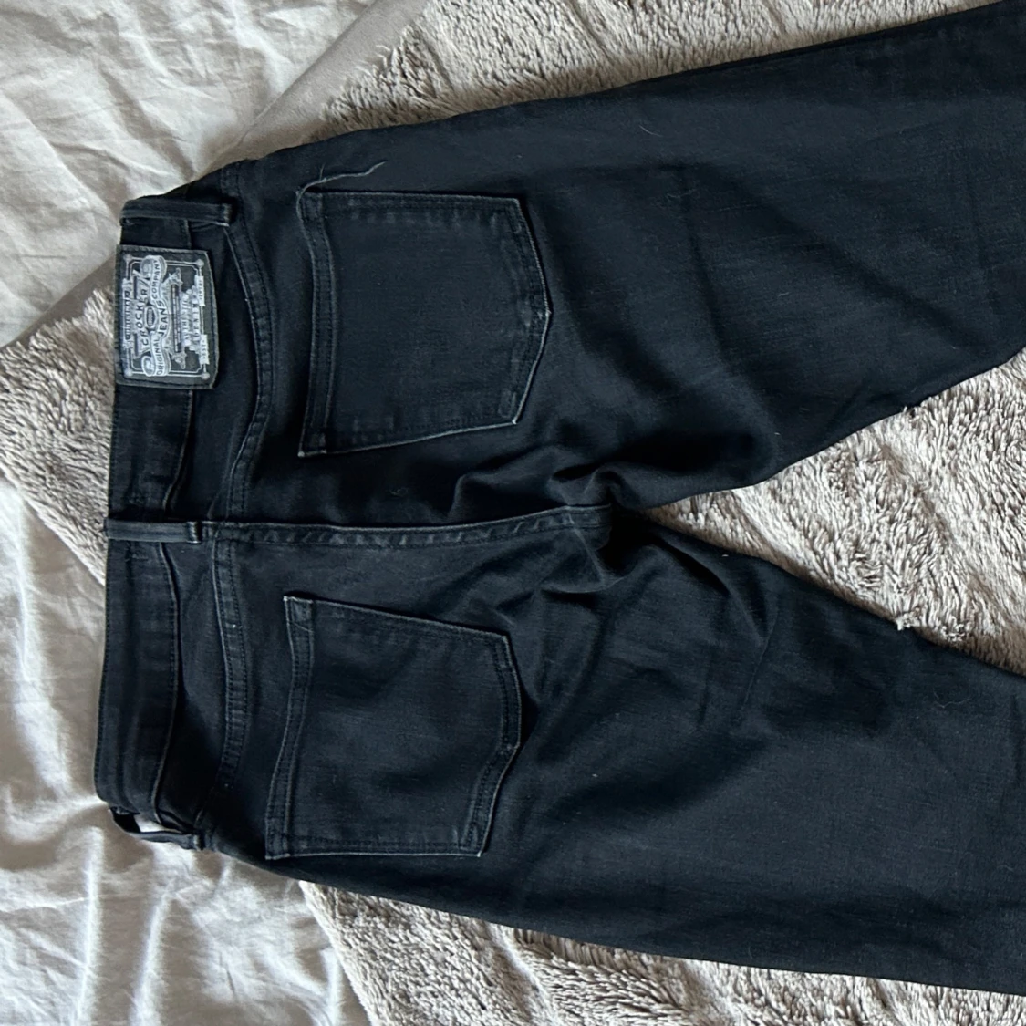 Svarta lågmidjade bootcut jeans från Crocker - 2