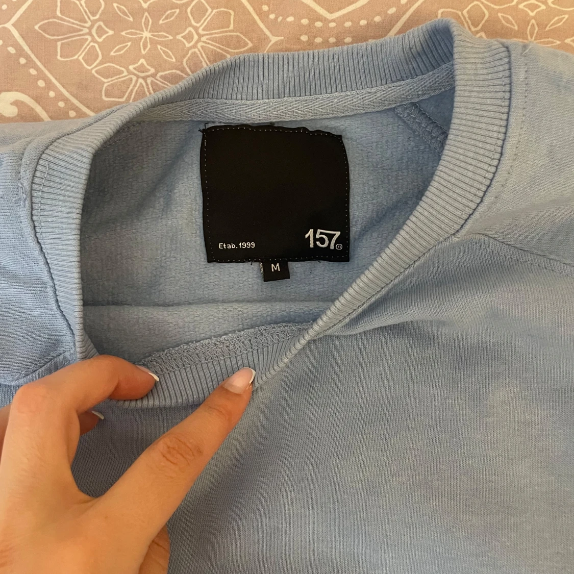 Ljusblå tröja från 157 - 1