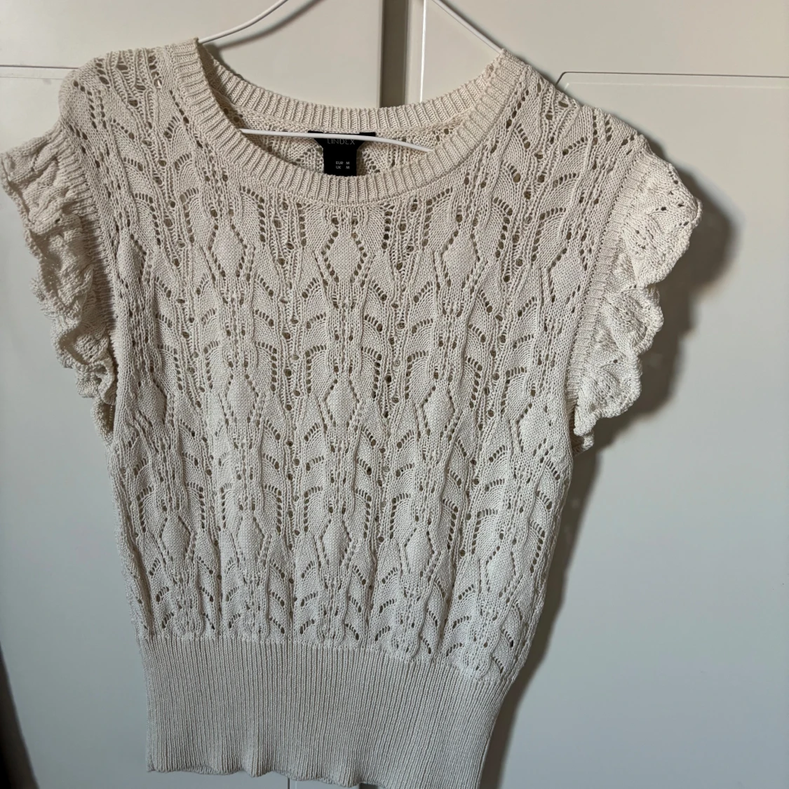 Stickad topp