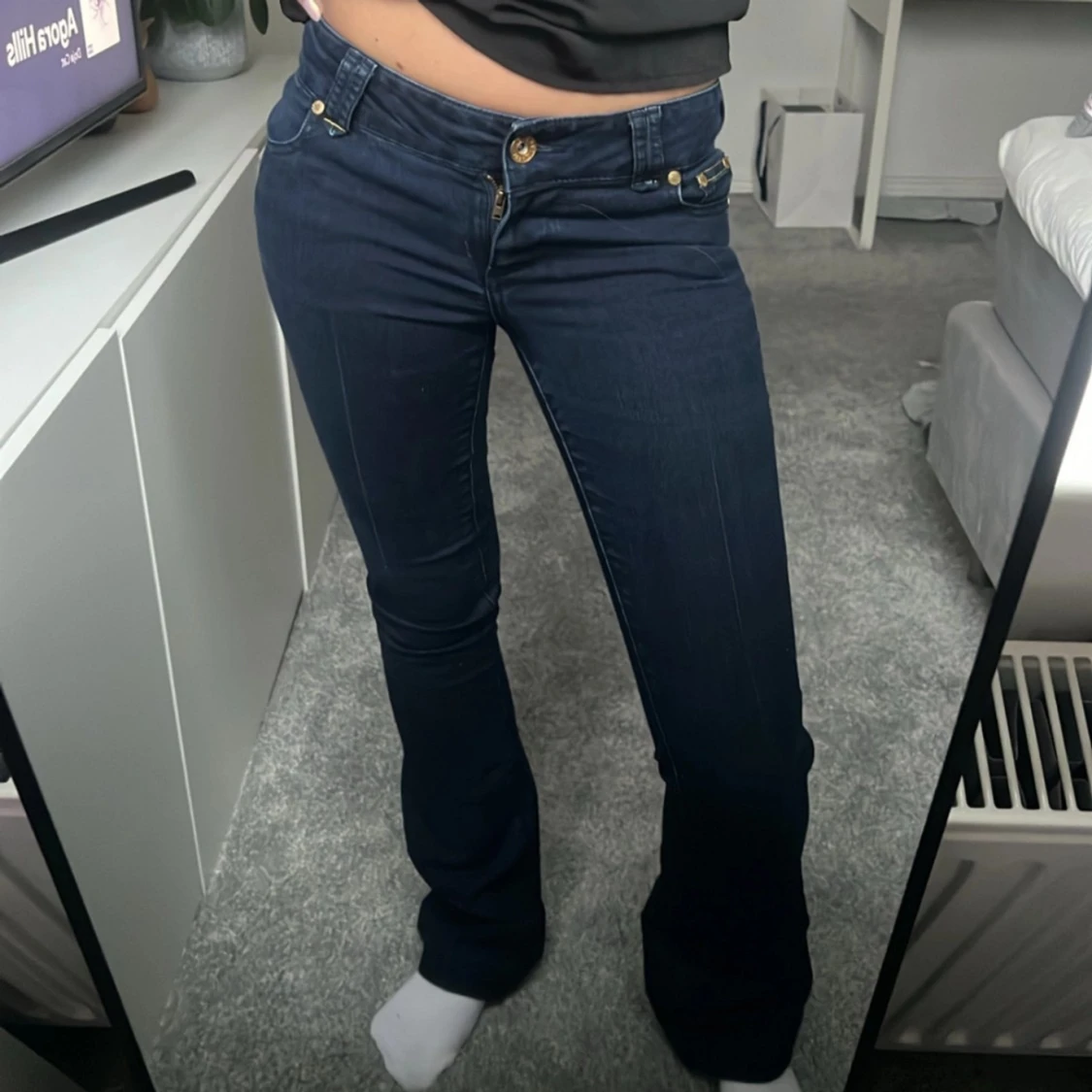 Mörkblå jeans med bootcut - 2