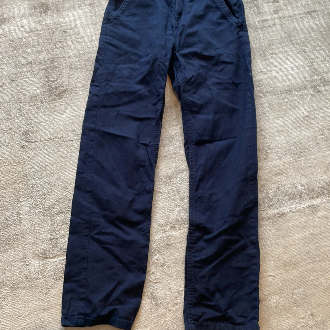 Mörkblå chinos från Lindex, strl 146