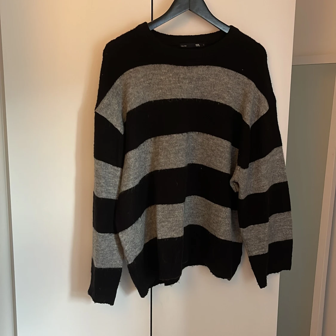 Randig stickad tröja från 157