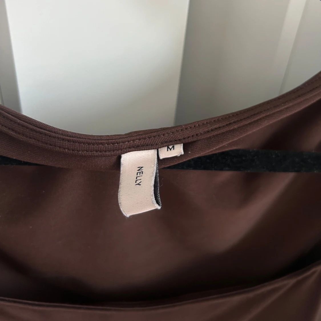 Brun mesh topp från Nelly - 2