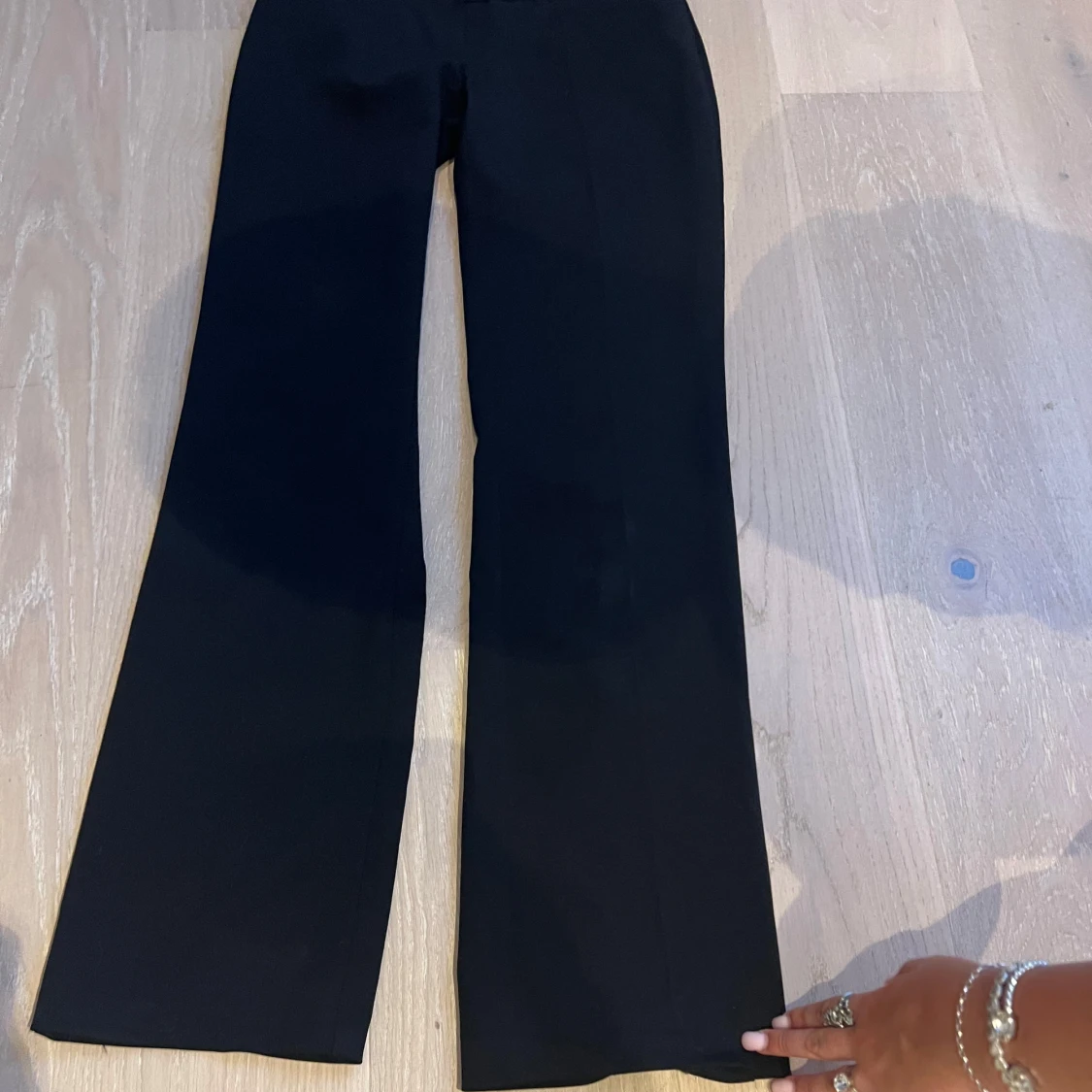 Svarta extra lowwaist, bootcut kostymbyxor