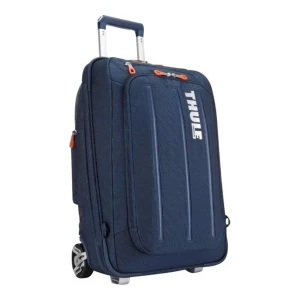 Blå resväska Thule med hjul - Snygg marinblå resväska från Thule med två hjul, utdragbart handtag och smarta axelremmar så du kan bära den som ryggsäck. Tillverkad i slitstark polyester och har flera fack med dragkedja. Perfekt för dig som vill resa smidigt och stilrent.