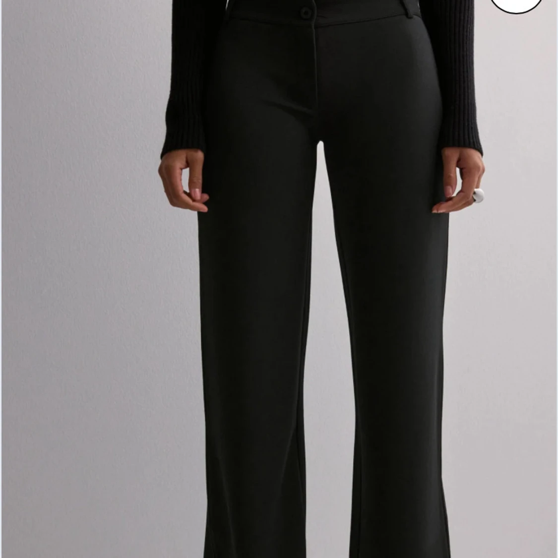Svarta kostymbyxor