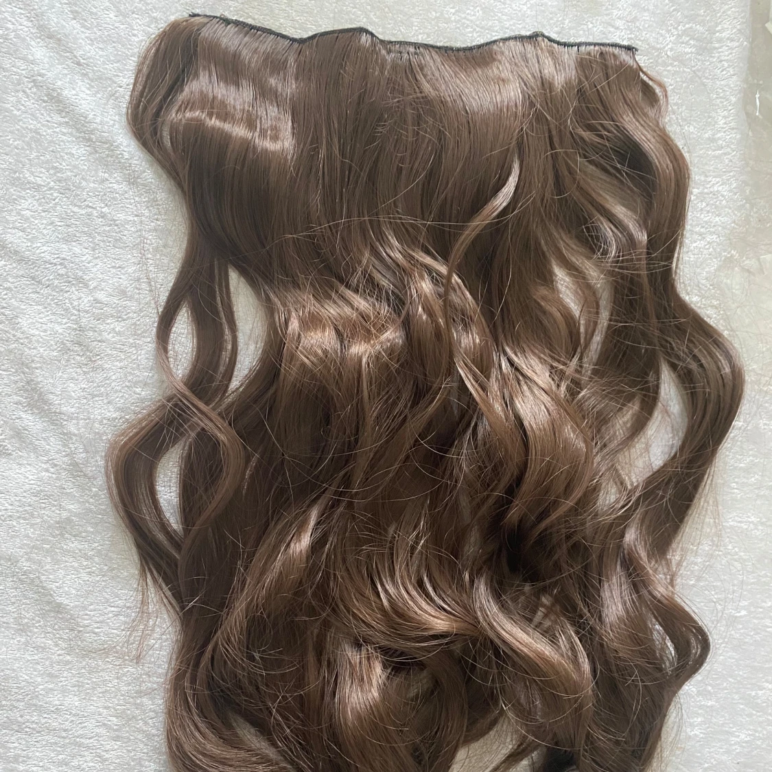 Brun hårförlängning med clips
