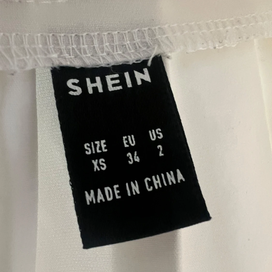 Vit plisserad kjol från SHEIN XS - 2