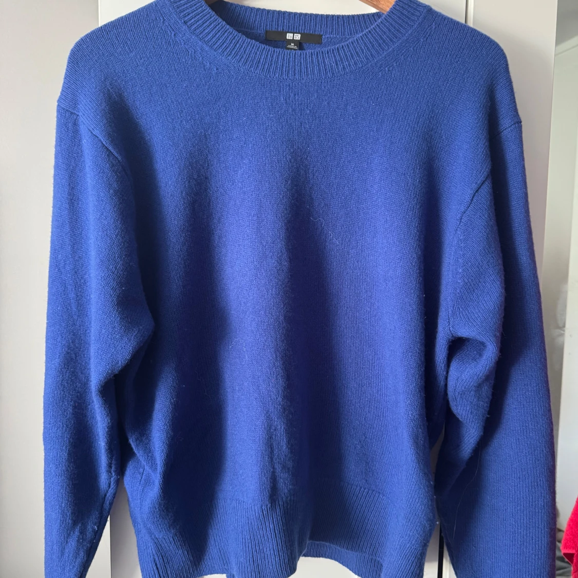 Blå stickad tröja från Uniqlo