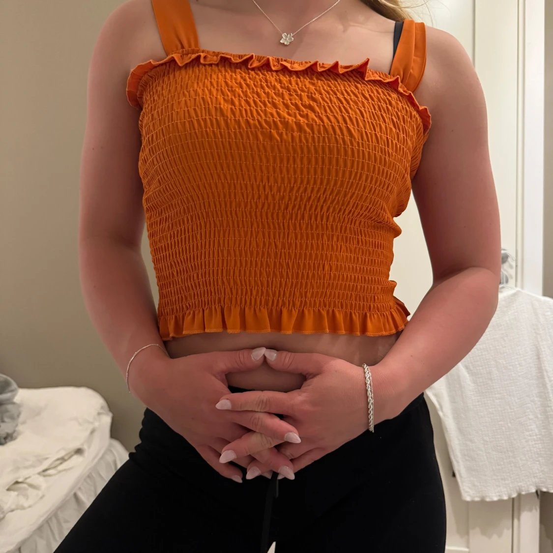 Orange ribbad linnetopp