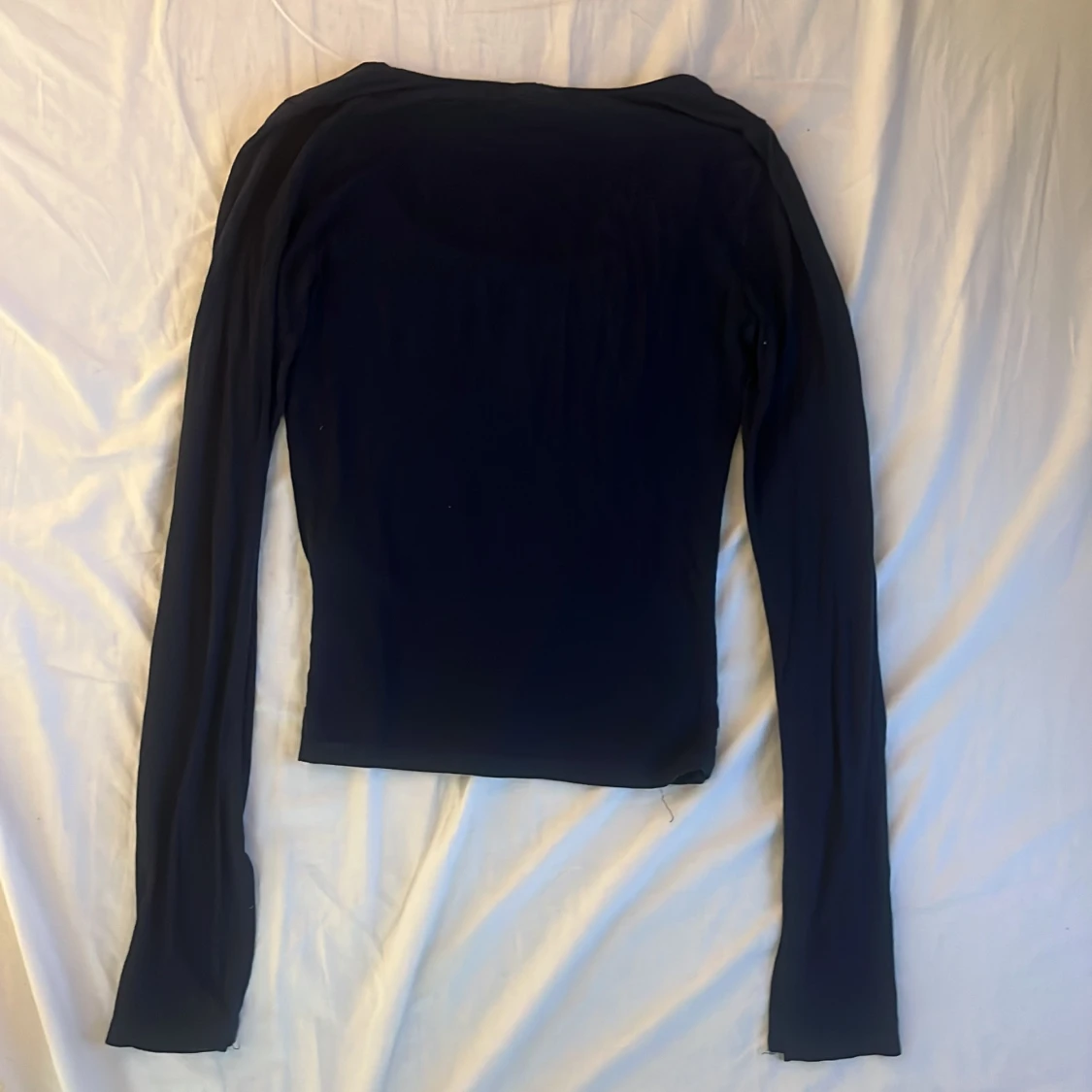 Svart långärmad topp från Gina Tricot - 1