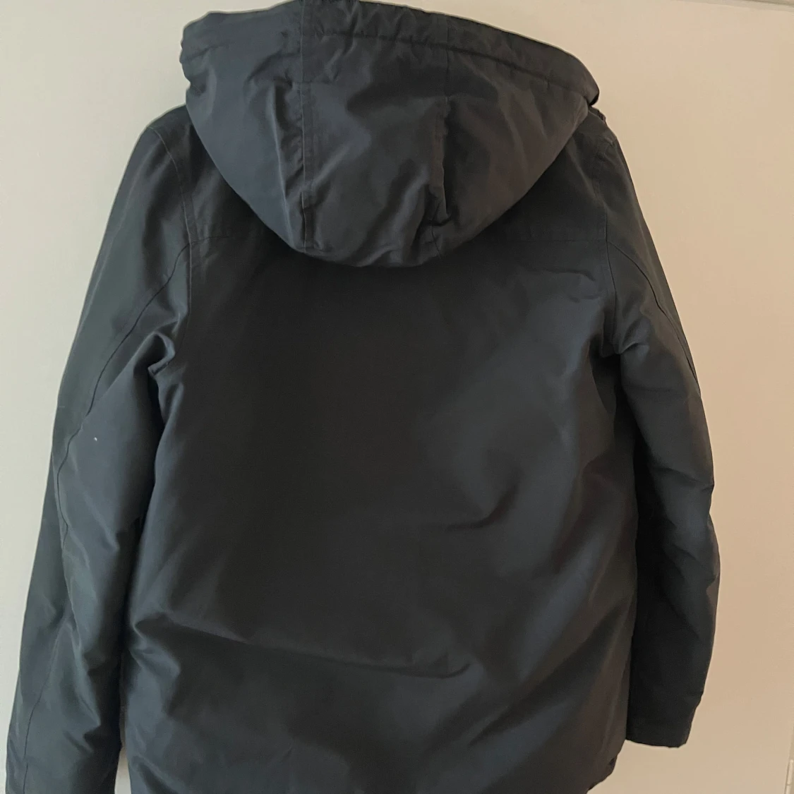 Svart jacka med huva från Woolrich - 2