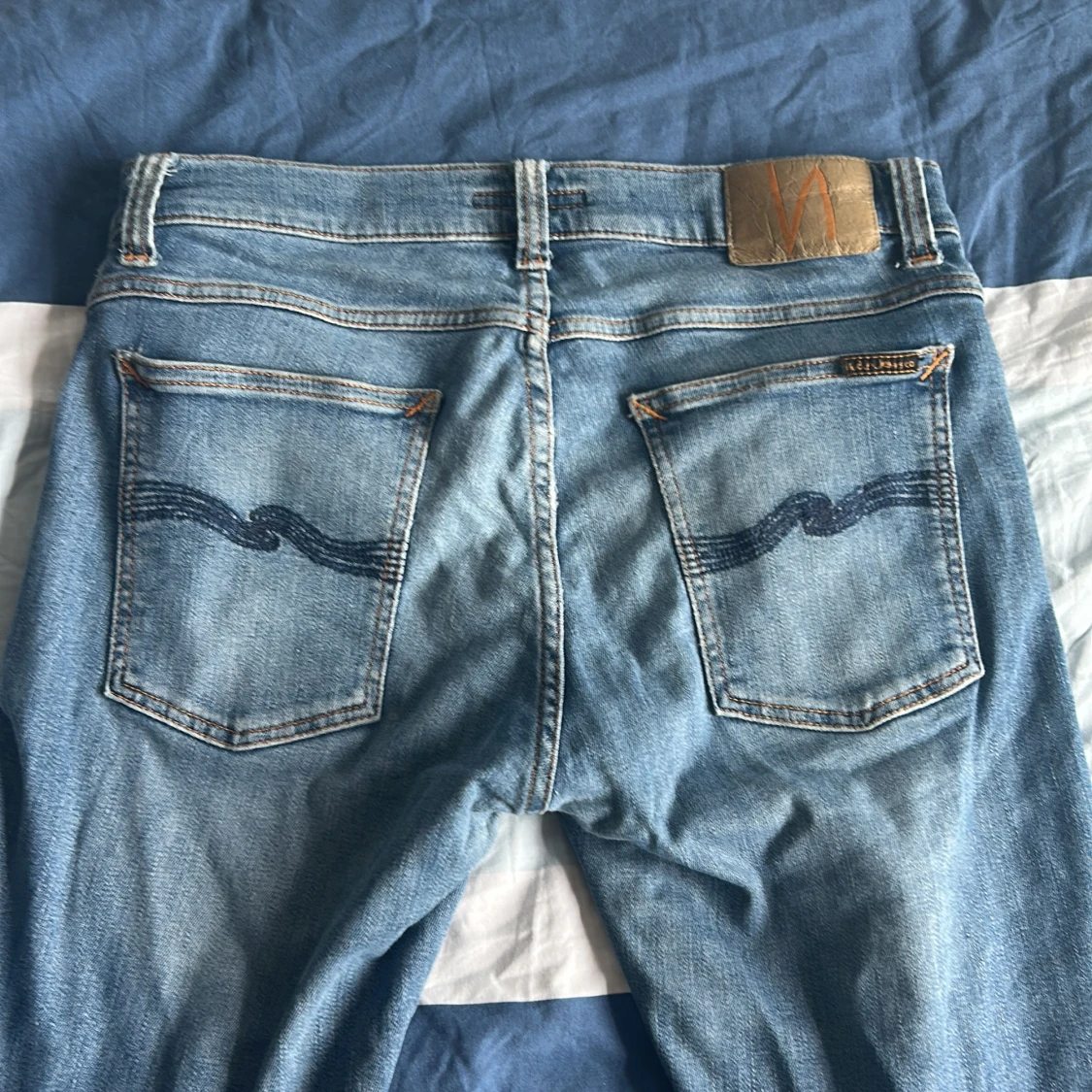 Ljusblå nudie jeans - 1