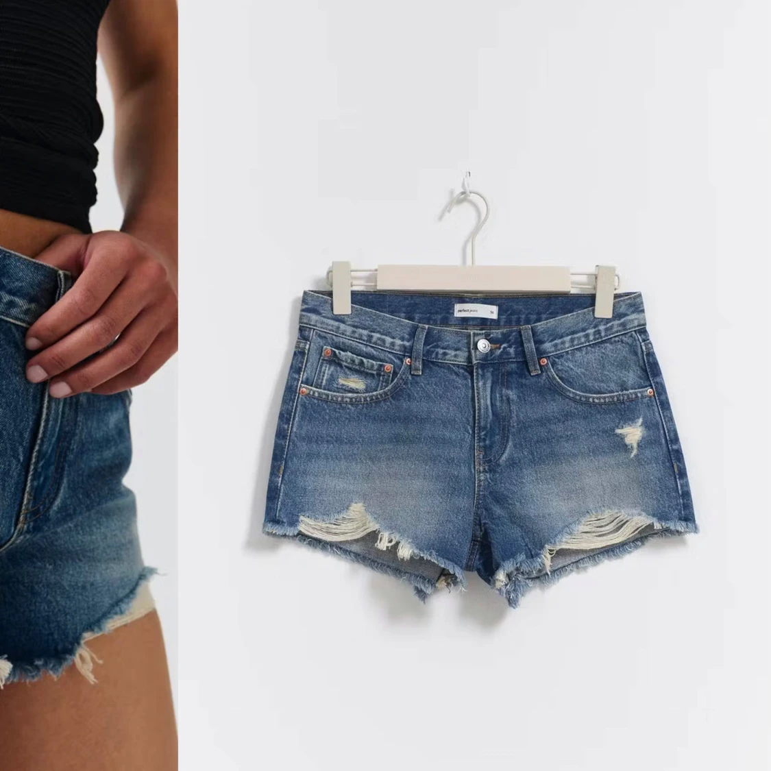 Blå jeansshorts med slitningar
