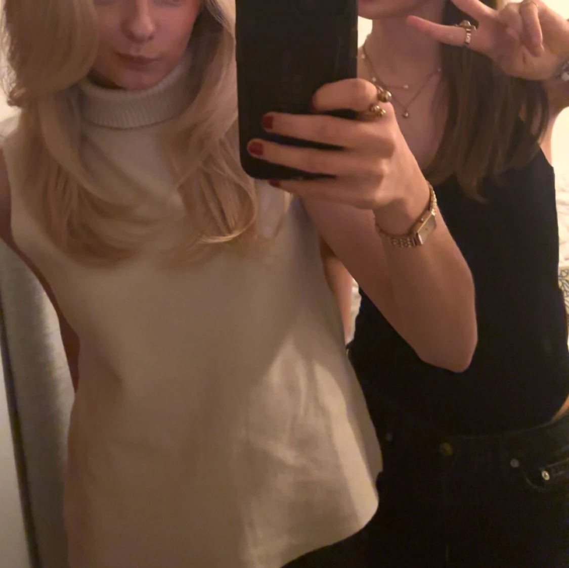 Vit ärmlös polotopp