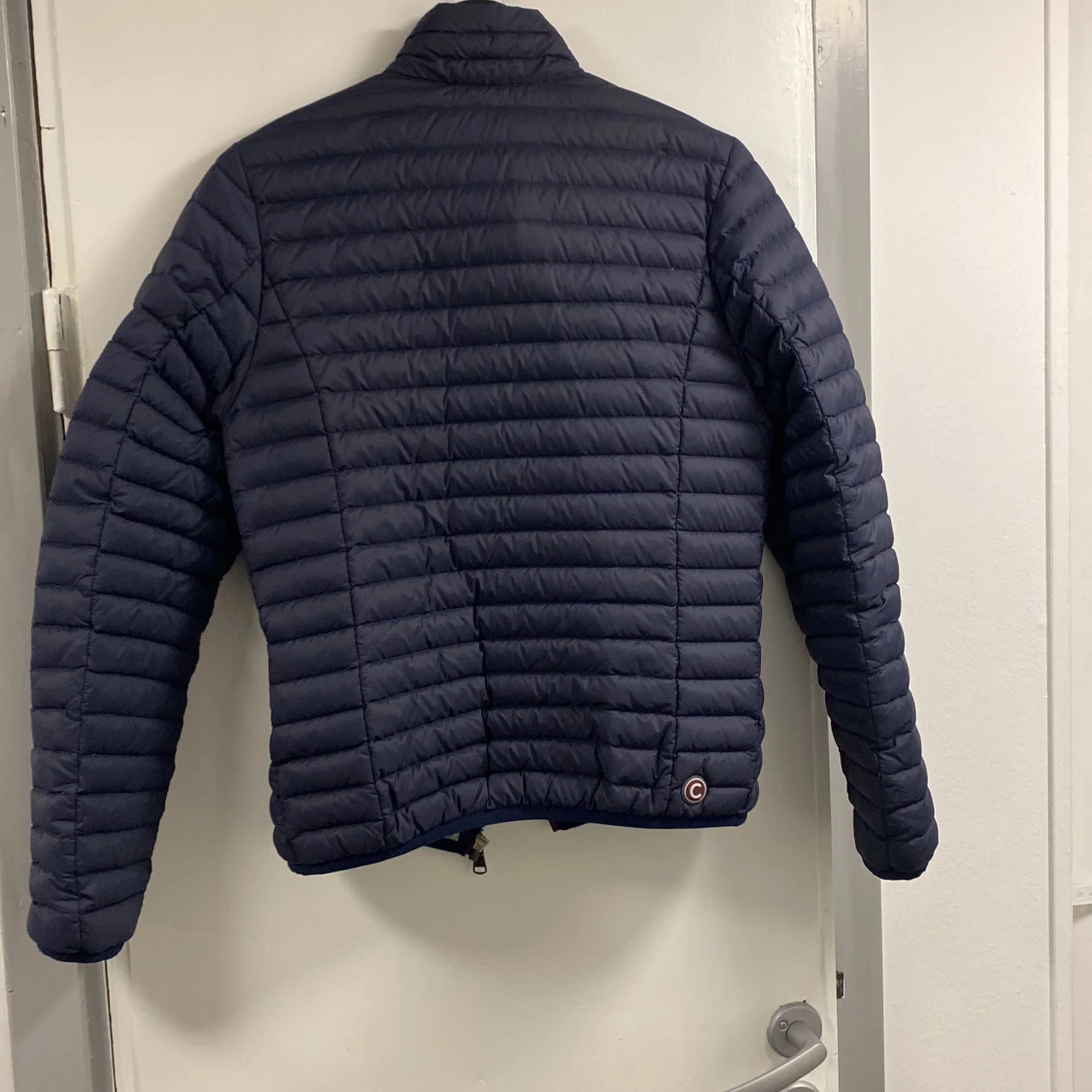 Mörkblå pufferjacka från Colmar - 1