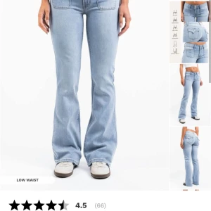 Ljusblå bootcut jeans från Madlady - Säljer ett par ljusblå bootcut jeans från Madlady med låg midja och framfickor. Jeansen har klassisk femficksdesign och är tillverkade i denim. Perfekta för dig som gillar en retroinspirerad look.