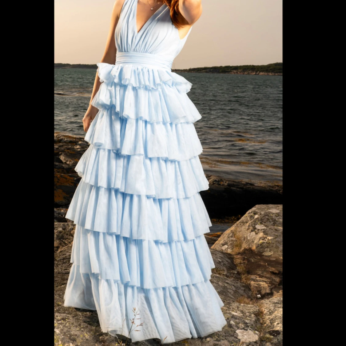 Ljusblå volangklänning Bubbleroom