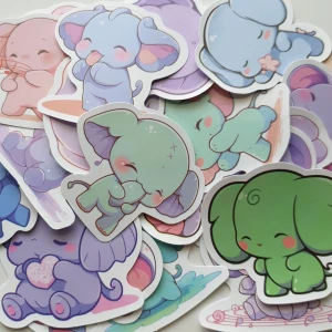 25st elefant klistermärken/stickers  - Bilderna visar ett set med söta klistermärken föreställande tecknade elefanter i olika färger och poser. Perfekt för att dekorera anteckningsböcker, laptops eller mobilskal. Passar dig som gillar kawaii-stil och vill sätta en personlig touch på dina prylar.