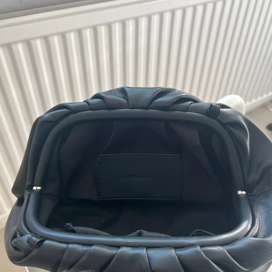 Svart clutchväska  - 1