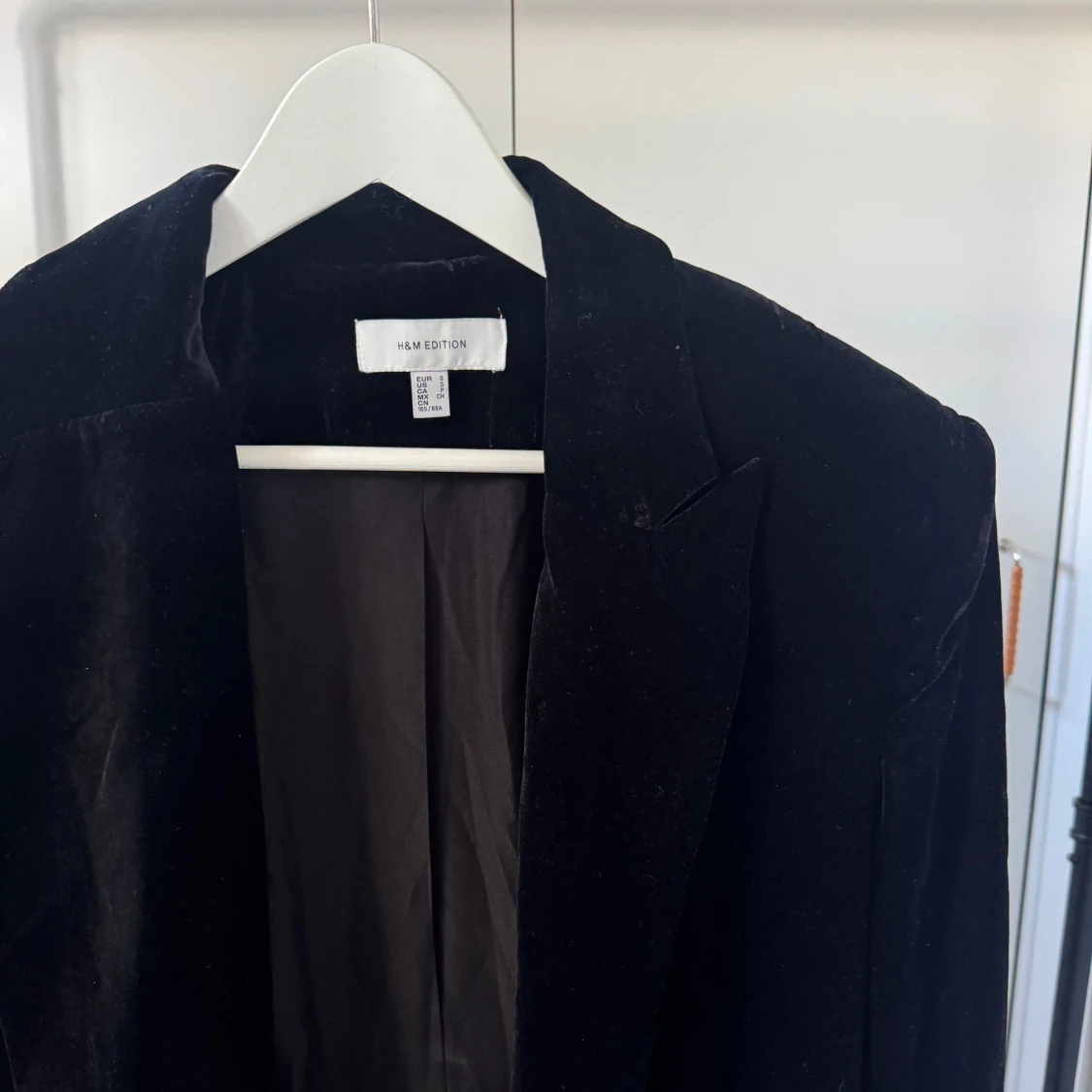 Svart kappa från H&M Edition - 2