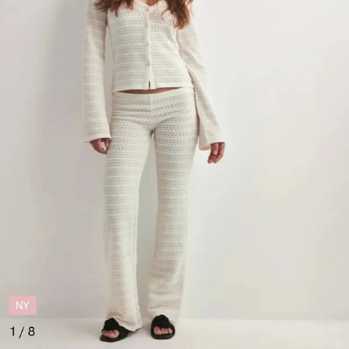 Vita stickade byxor med utsvängda ben - 1