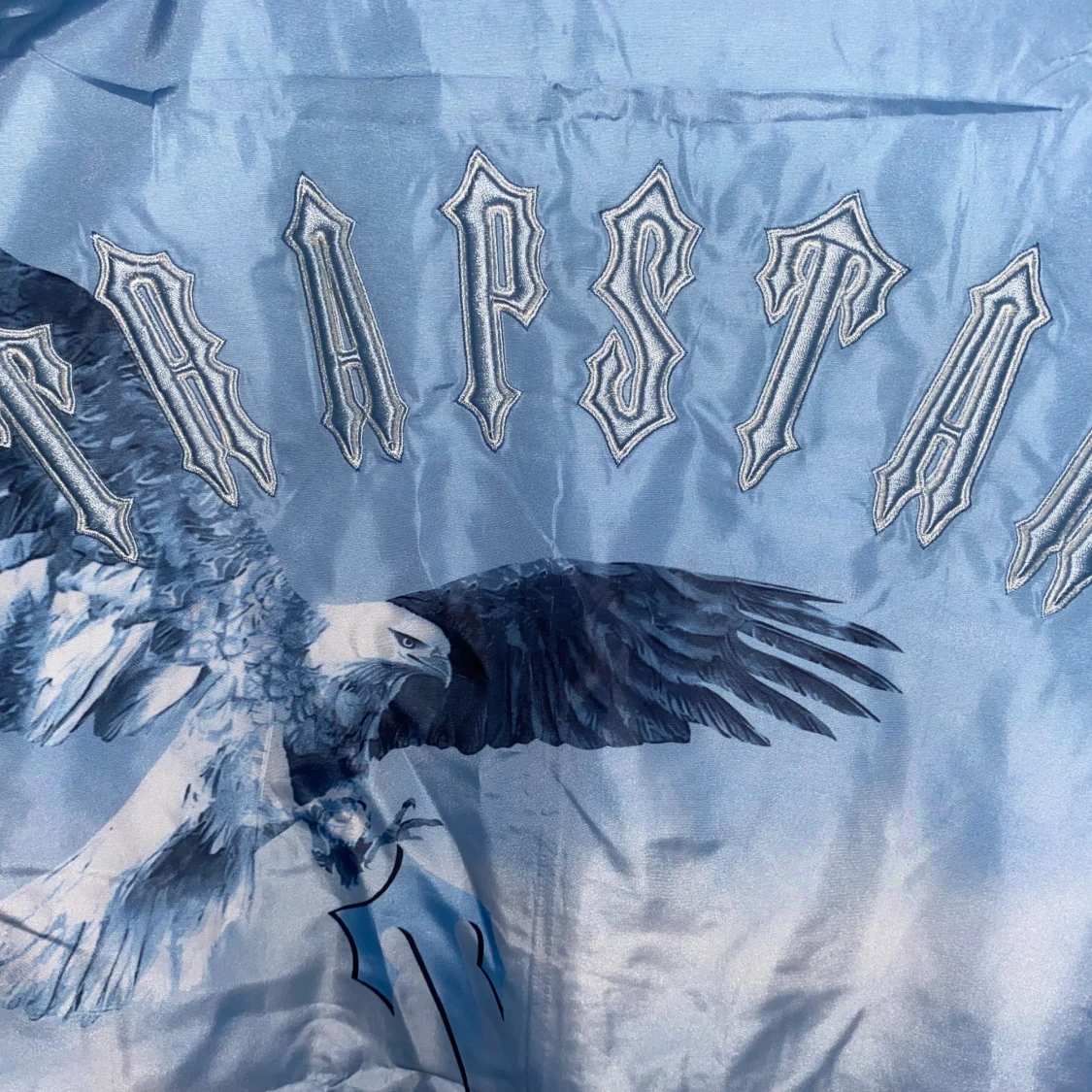 Ljusblå vindjacka med örntryck från Trapstar - 3