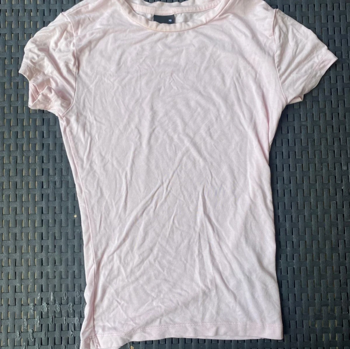 Ljusrosa t-shirt från Gina Tricot