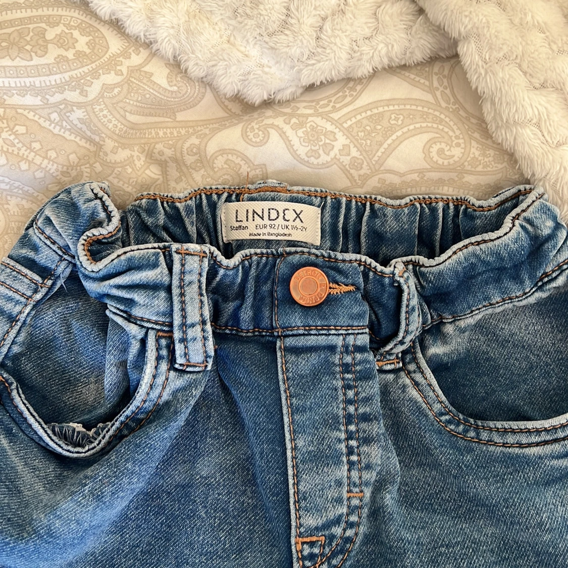 Blå jeansbyxor från Lindex barn  - 1