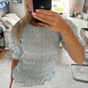 Ljusblå topp - Fint skick!