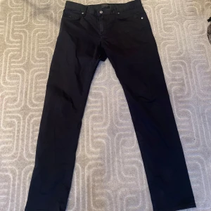 Svarta golf byxor från J.Lindeberg - Svarta golf byxor från J.Lindberg, slim fit W30 L32