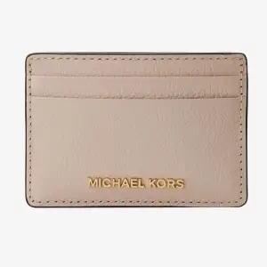 Michael kors korthållare, plats för 4 kort. Det finns slitage 