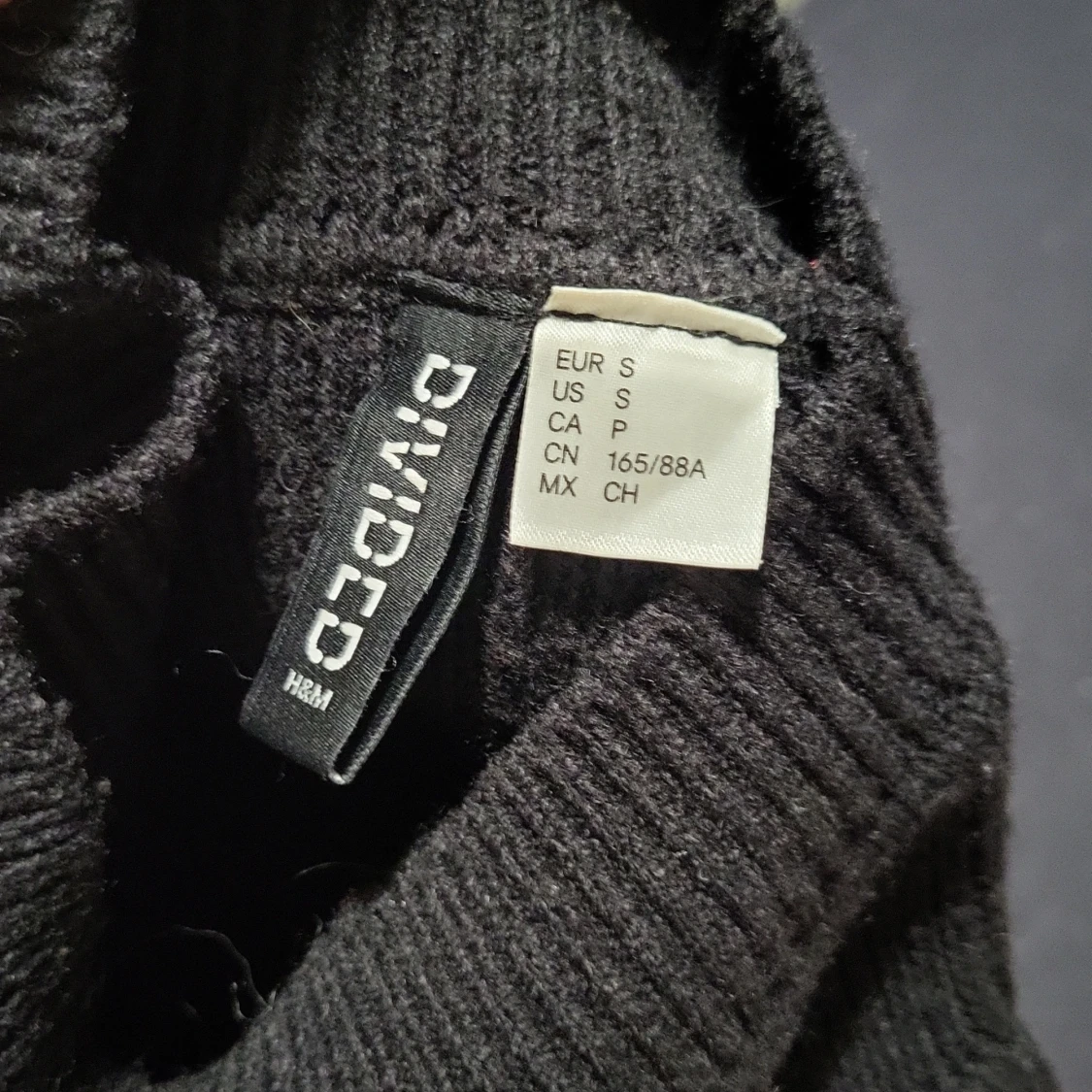Stickad svart tröja  - 90