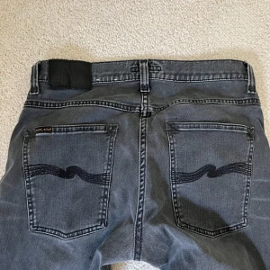 Nudie Jeans  - Modell Grim Tim, mycket eftertraktade jeans, storlek 31/32, mycket bra skick. 