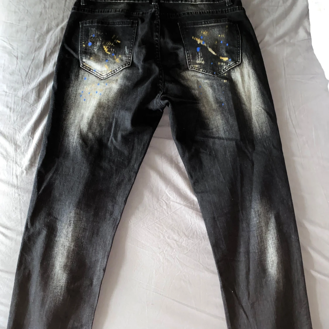 Svarta jeans med färgstänk - 90