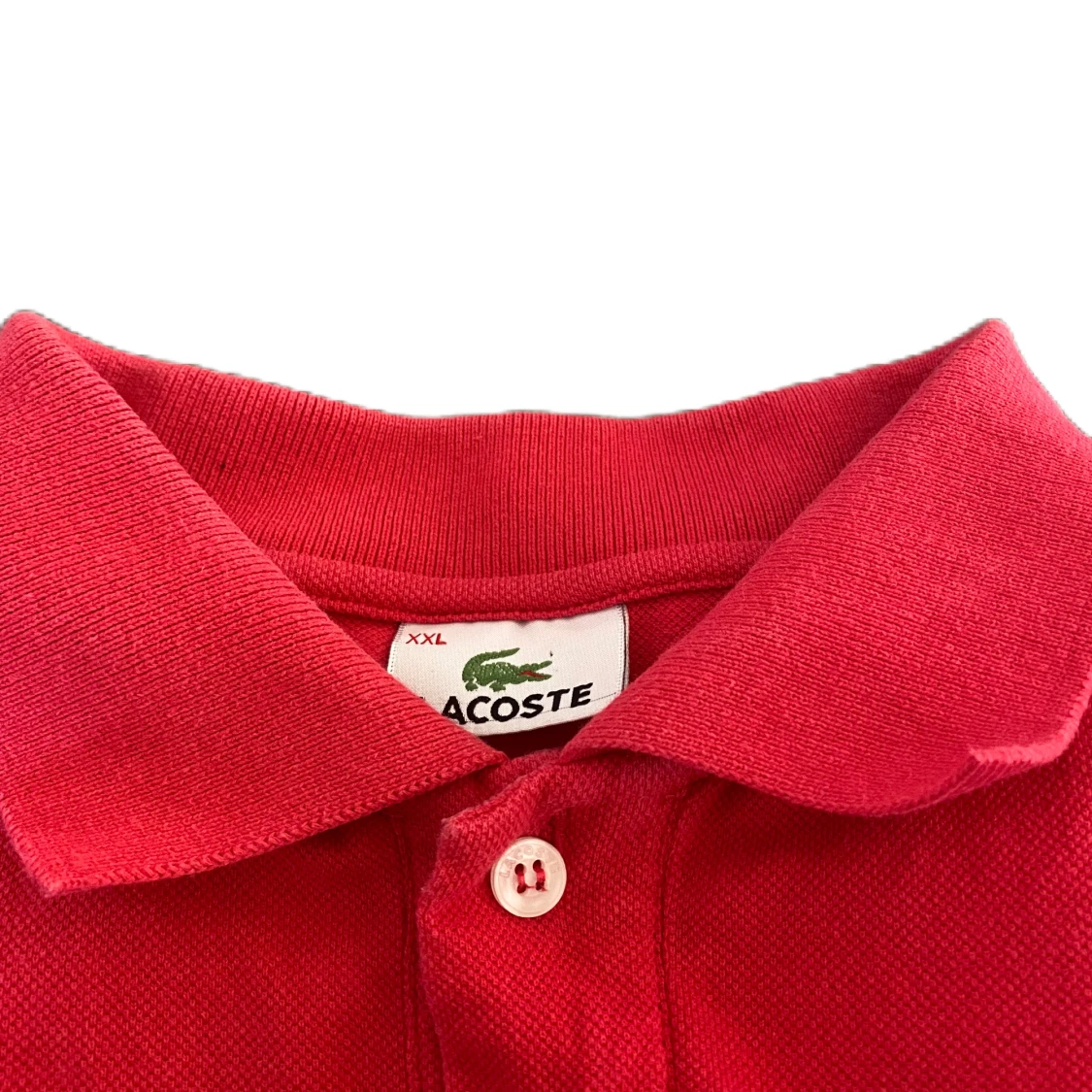 Röd pikétröja från Lacoste - 90