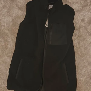 Teddyväst - Teddyväst storlek 160 men passar XS 