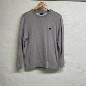 J.Lindeberg tröja  - J.Lindeberg tröja i storlek S.