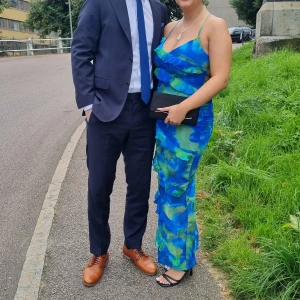 Långklänning - Använd 1 gång Storlek S, man knytet där bak så kan passa både Xs och M