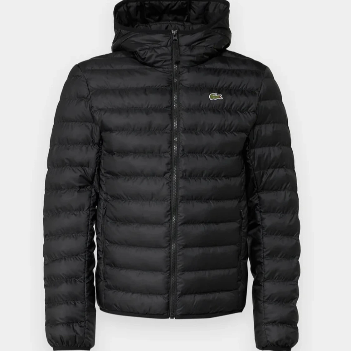 Svart pufferjacka från Lacoste - 90