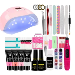Nagelvårdskit med LED-lampa och verktyg, ser ej ut så det jag har men kan sicka privat till den som är intresserad hur det ser ut. - Detta nagelvårdskit innehåller en rosa LED-lampa för gelnaglar, flera nagelfilar, buffertar, och en elektrisk nagelfil. Det finns också poly gel i olika färger, bas- och topplack, samt dekorationer som glitter och nagelbandspusher. Perfekt för att skapa salongskvalitet naglar hemma!