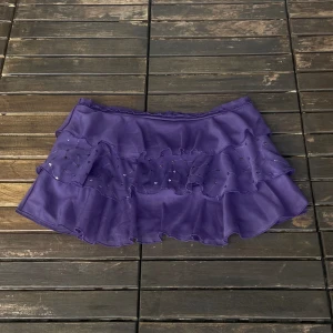 Lila volangkjol - Uppskattad storlek 