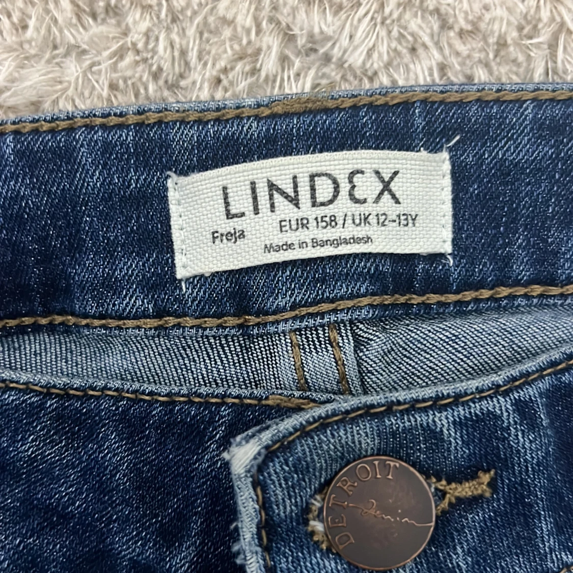 Mörkblå bootcut jeans från Lindex - 2