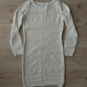 Vit klänning  - Aldrig använt 