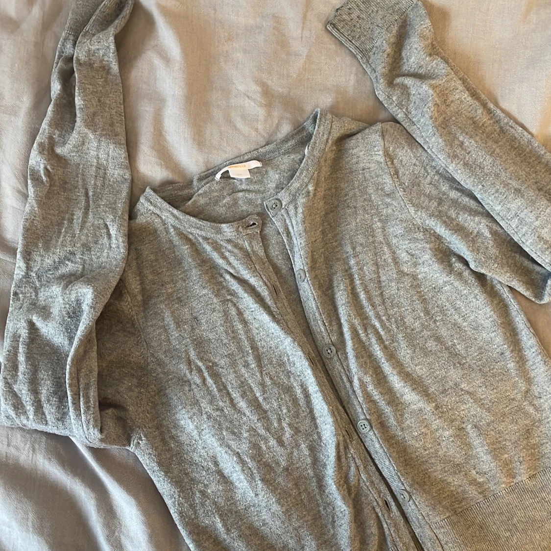 Grå kofta från Gina Tricot