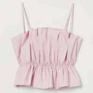 Ljusrosa tube topp - En tajt och söt ljusrosa topp med justerbara band. Pris kan diskuteras.