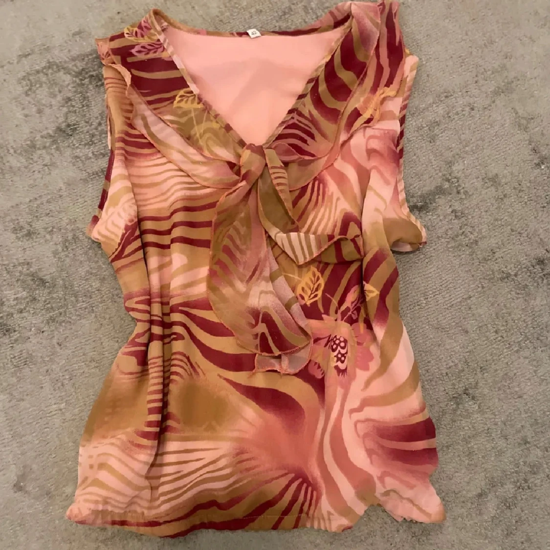 Mönstrad ärmlös blus med knyt vintage