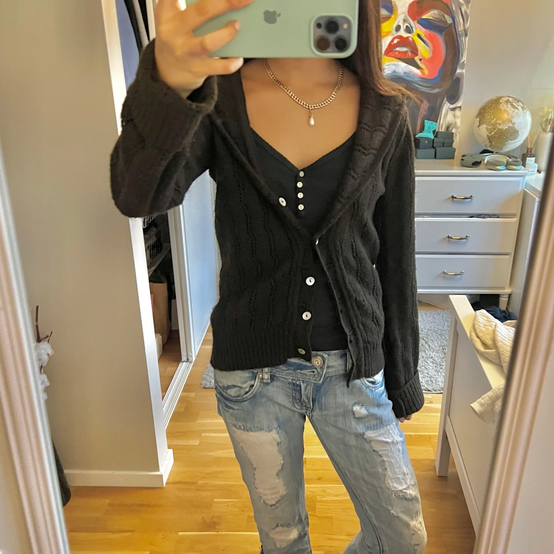 Svart kofta med knappar